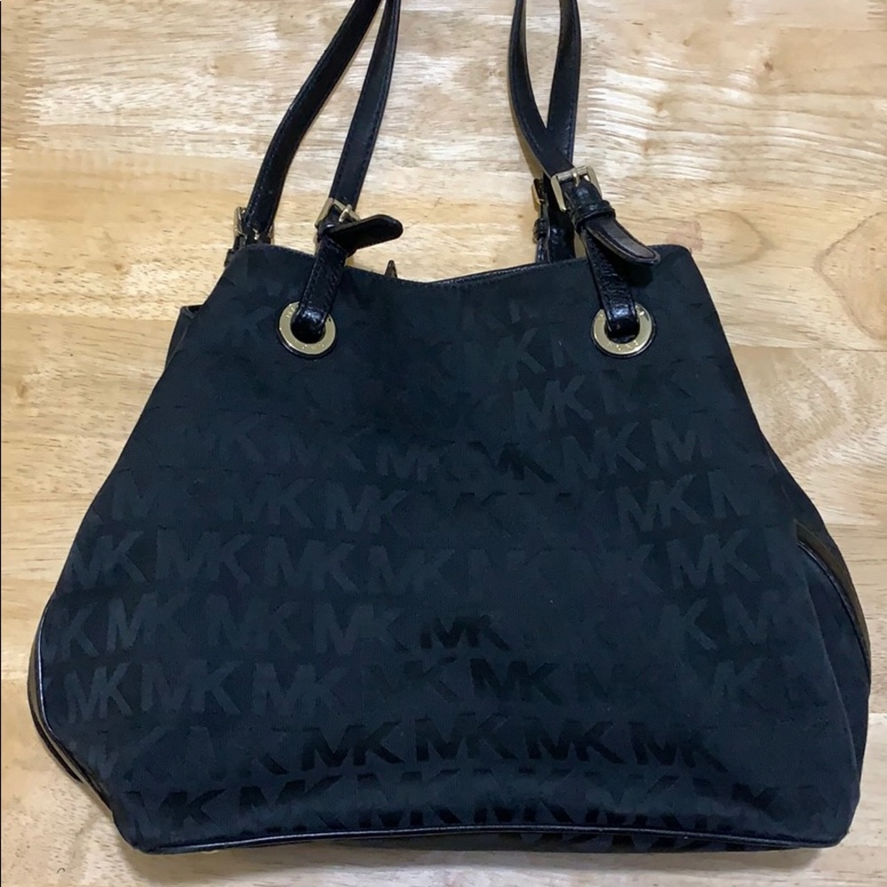 Lightly used black Michael Kors handbag